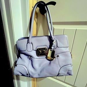 B. Makowski bag, lilac or lavender in color , soft leather and very roomy.